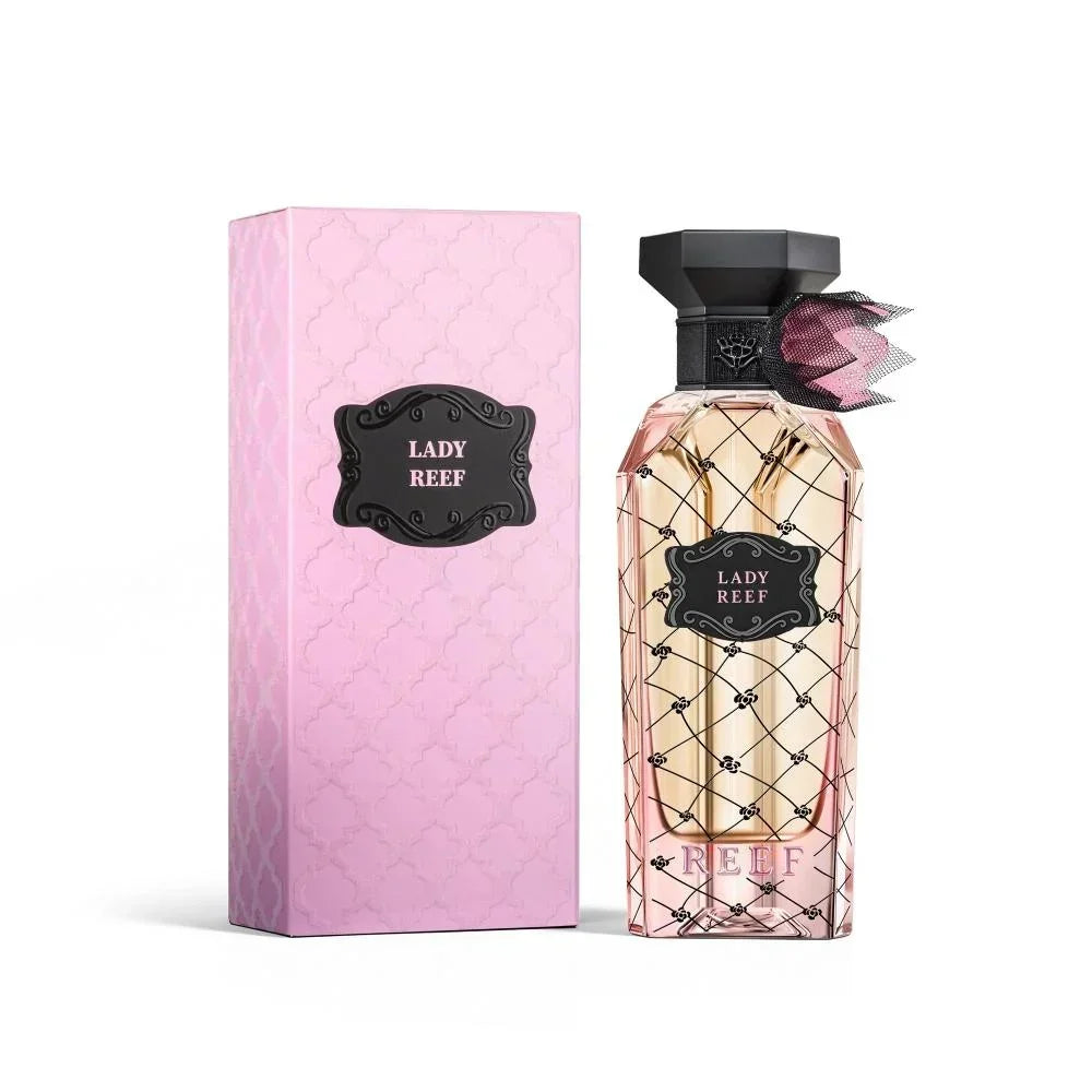Lady Reef perfume bottle with pink packaging, elegant design, and floral accents