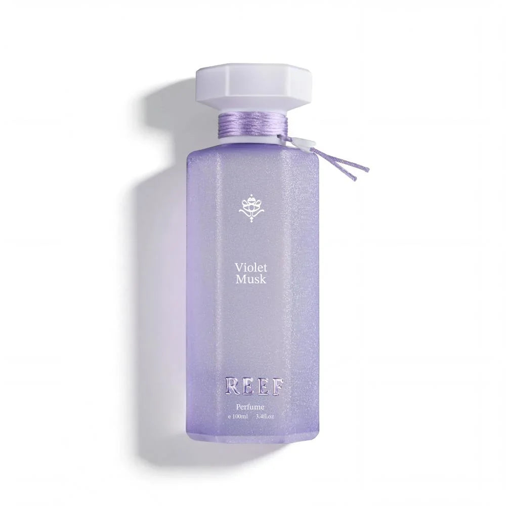 Violet Musk perfume bottle with shimmering lavender design and elegant ribbon accent