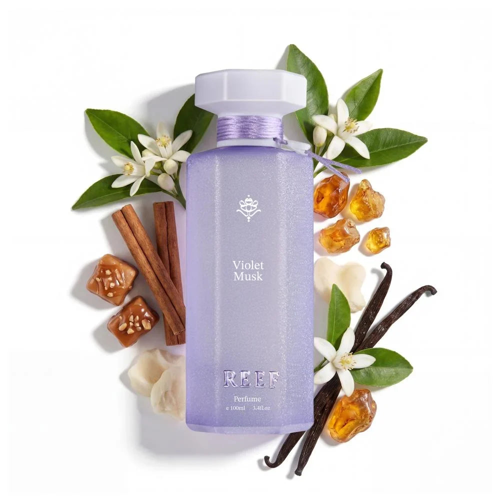 Violet Musk perfume bottle with cinnamon, vanilla, and white flowers