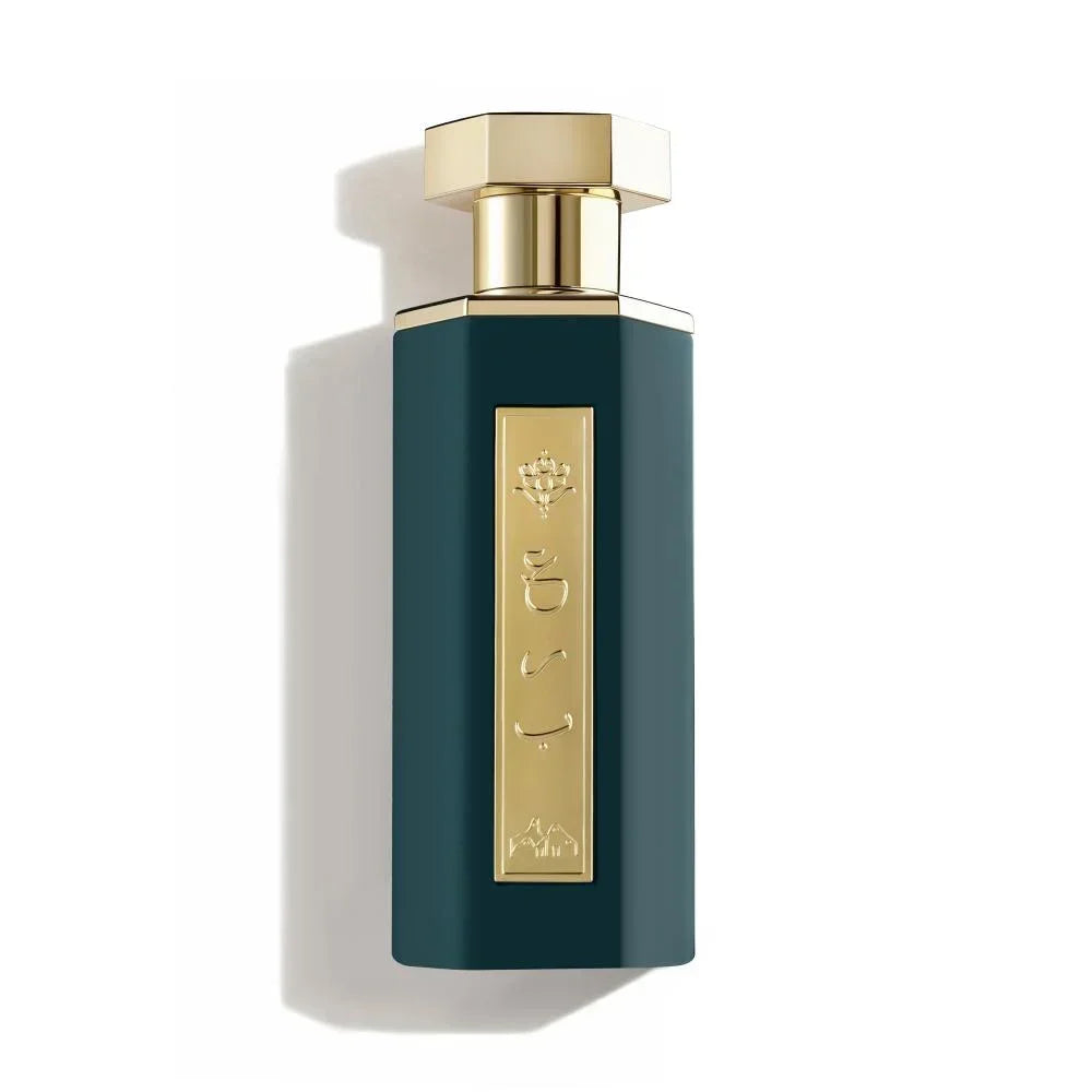 Elegant dark green perfume bottle with gold accents and Arabic script, evoking Oriental luxury