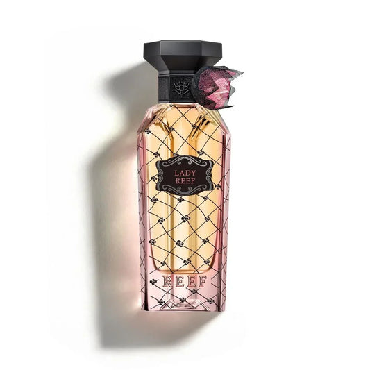 Lady Reef perfume bottle with elegant lattice design and pink ribbon accent