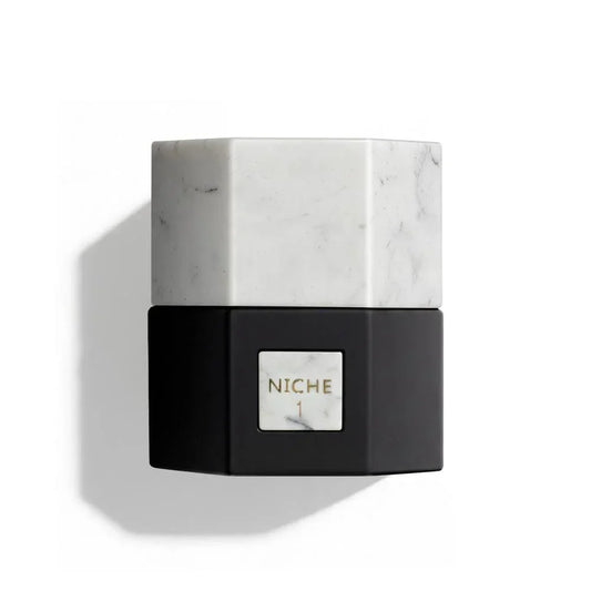Niche 1 luxury perfume bottle with marble and black geometric design, evoking oriental elegance