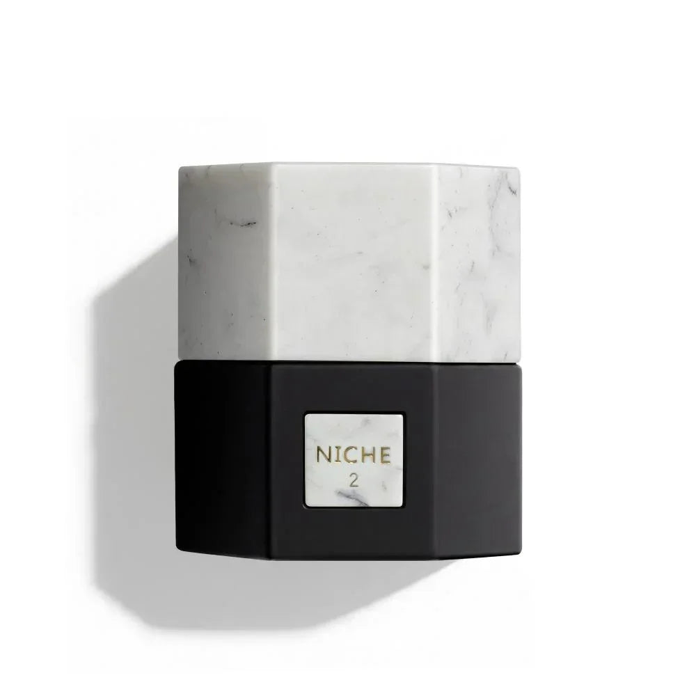 Niche 2 luxury perfume bottle with marble cap and black base, elegant fragrance design