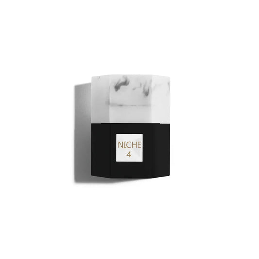 Niche 4 perfume bottle with marble cap and black base, elegant luxury fragrance design