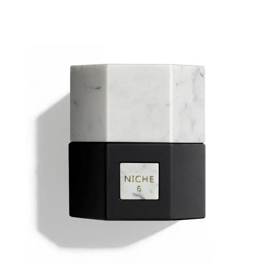 Niche 6 luxury perfume bottle with marble and black design, elegant fragrance for discerning tastes