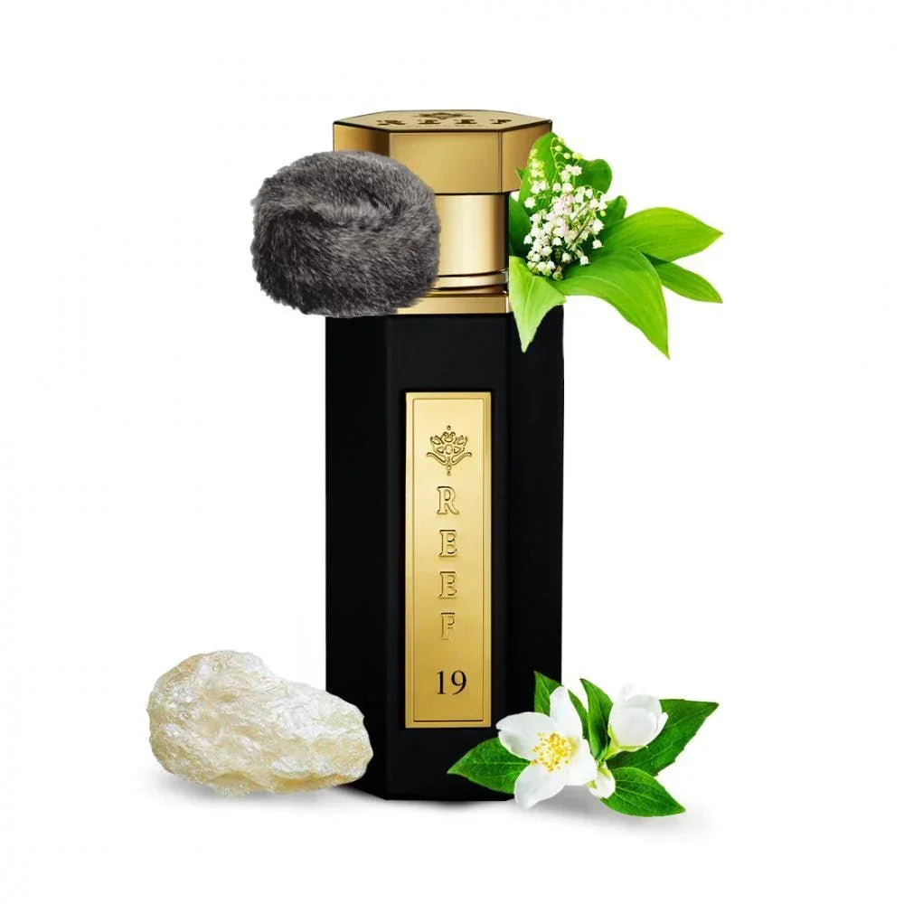 Luxury black perfume bottle with gold cap, jasmine, lily of the valley, and oud resin, evoking Oriental scents.