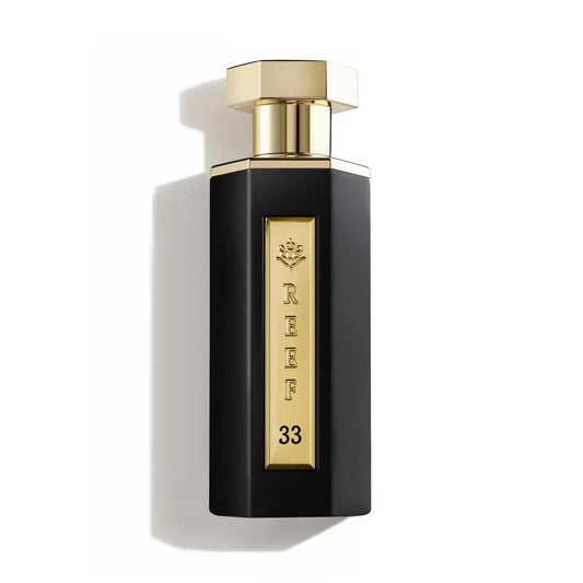 Luxury black perfume bottle with gold cap and REEF 33 label, evoking oriental fragrance notes