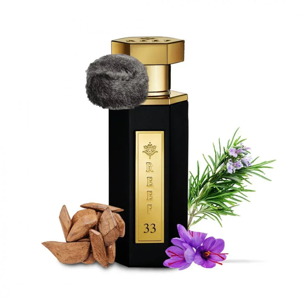 Luxury black perfume bottle with gold cap, oud wood, saffron, and lavender, evoking Oriental scents.