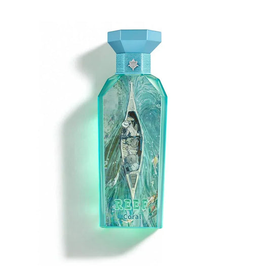REEF Coral perfume bottle with oceanic artwork and turquoise design