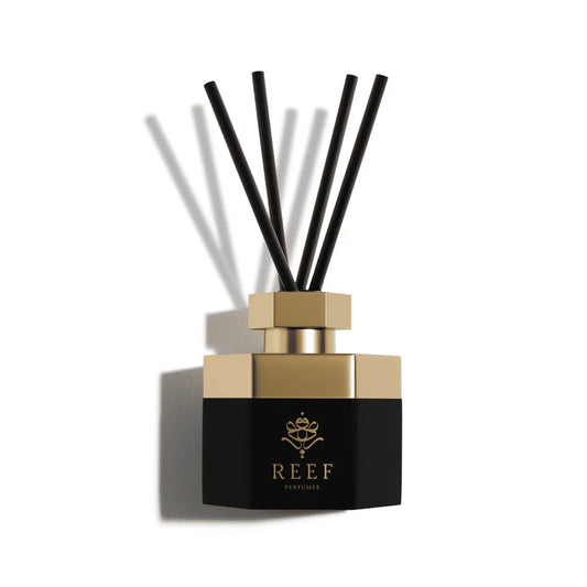 REEF Perfumes luxury reed diffuser with black and gold design for elegant home fragrance