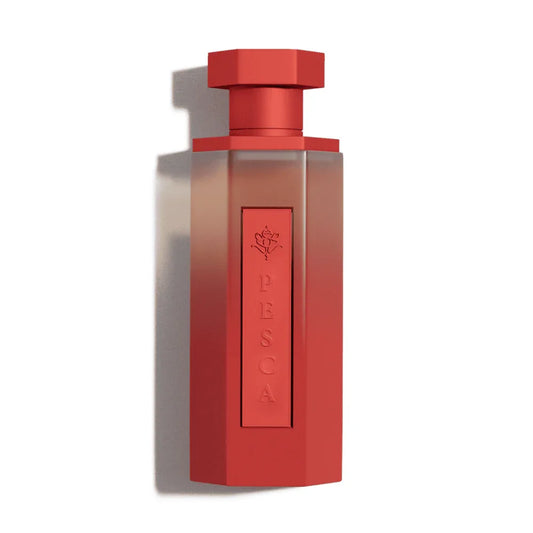 Red PESCA perfume bottle with floral emblem, evoking Oriental fragrance notes and luxury design